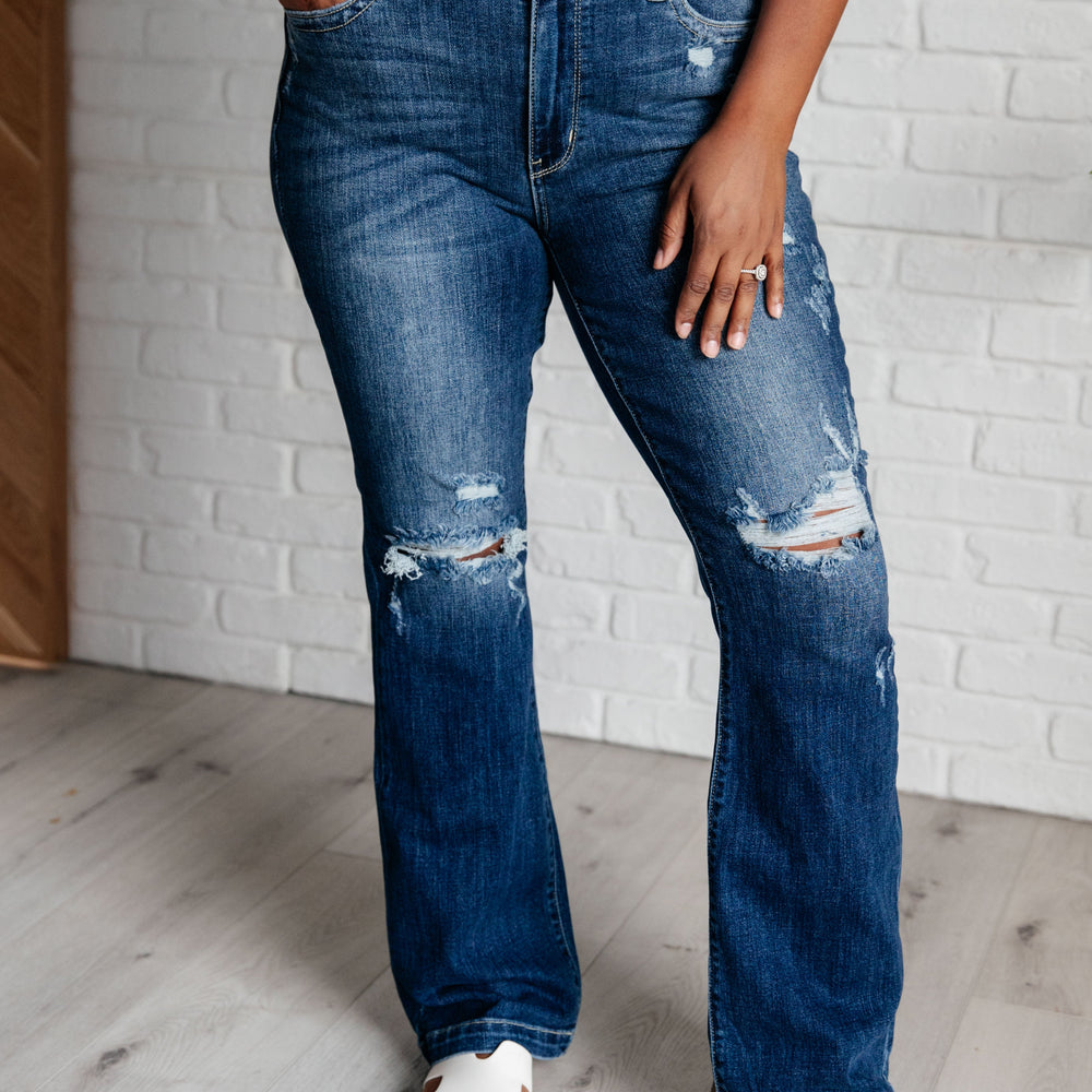 
                      
                        Mila Mid Rise Distressed Bootcut Jeans
                      
                    