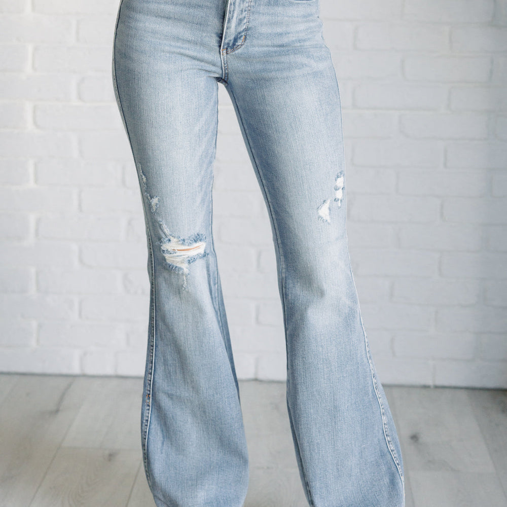 
                      
                        Caroline Mid Rise Control Top Distressed Flare Jeans
                      
                    