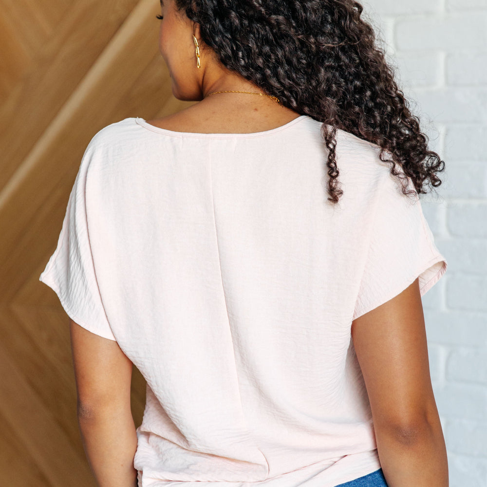 
                      
                        Frequently Asked Questions V-Neck Top in Blush
                      
                    