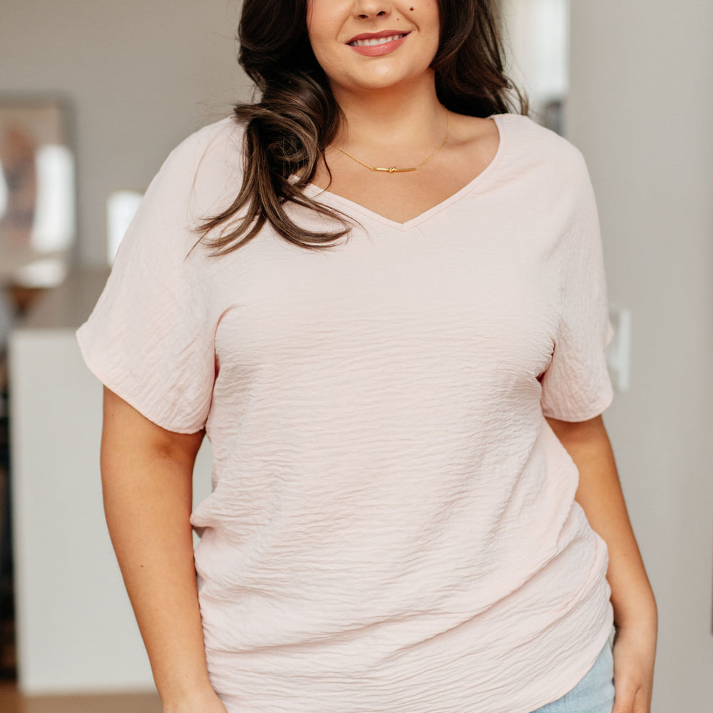 
                      
                        Frequently Asked Questions V-Neck Top in Blush
                      
                    