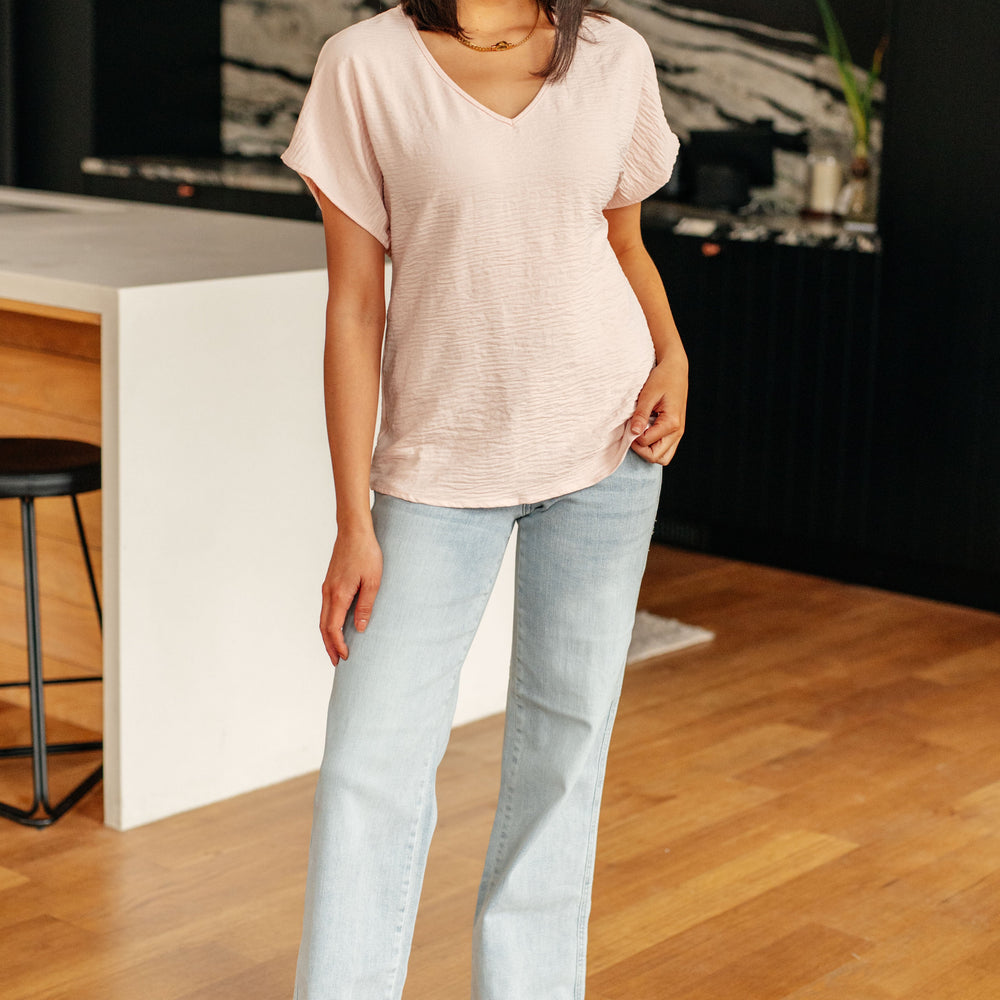 
                      
                        Frequently Asked Questions V-Neck Top in Blush
                      
                    