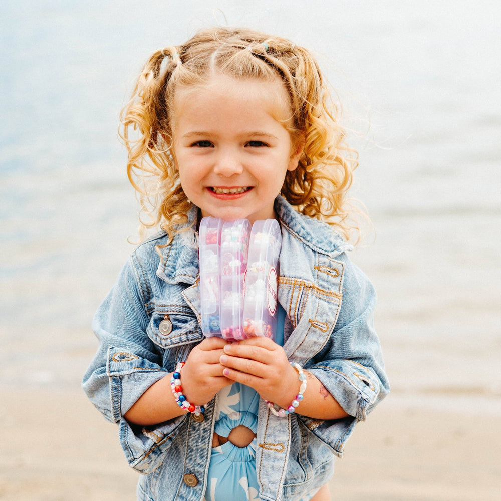 
                      
                        The Rainbow Swirl Popsicle Kit
                      
                    