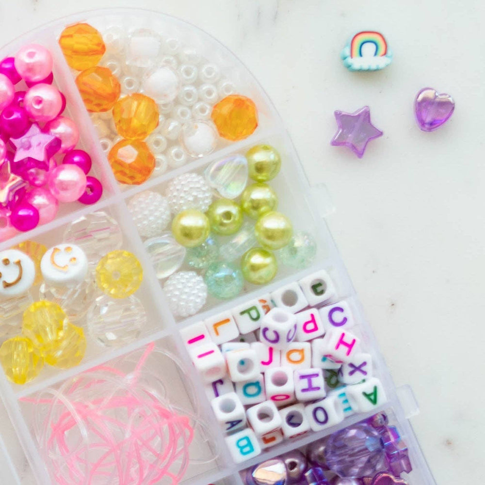 
                      
                        The Rainbow Swirl Popsicle Kit
                      
                    